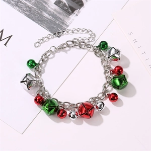 Christmas necklace and bracelet set with festive red, green and silver bells on white desk