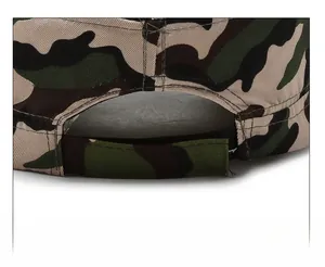 Detail of adjustable velcro strap on jungle camouflage hat for custom fit and comfort