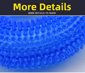Macro shot of durable blue TPR pet toy showing dense conical cleaning spikes for dogs