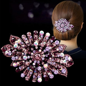 Macro detail of purple crystal floral headband with shimmering rhinestone craftsmanship