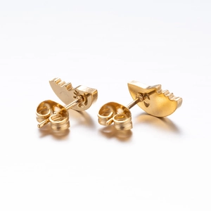 Asymmetric gold face stud earrings with moon abstract design and polished finish