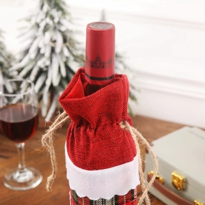 Festive Christmas wine bottle cover in red plaid burlap for holiday party table decor