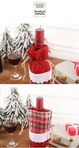 Detail of red burlap wine bag with plaid pattern and drawstring for Christmas bottles