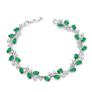 Elegant silver 18K white gold plated bracelet with emerald oval gems and zircons