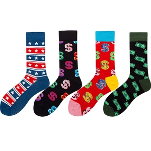 Four pairs of creative mid-calf socks with stars, stripes, and dollar money patterns