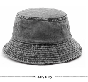 Macro view of army green washed denim bucket hat with metallic side air vents and stitching