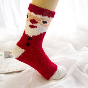 Thick warm coral fleece Christmas socks featuring red and white Santa Claus design