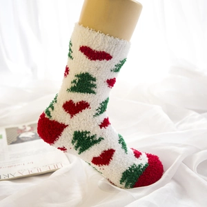 Thick coral fleece Christmas socks featuring red heart and green tree patterns