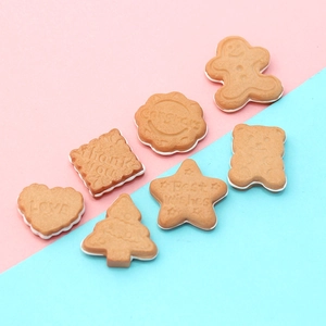 Miniature resin cookies set with festive shapes and embossed greetings for DIY crafts