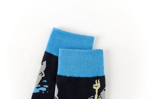 Detailed macro view of the ribbed cuffs on shark pattern cotton crew socks for men