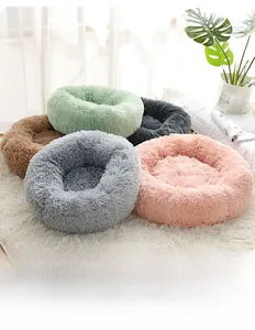 Detail of plush round pet beds showing ultra-soft texture and various color options