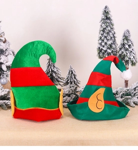 Detail of red and green striped elf hats with yellow ears for Christmas party decor