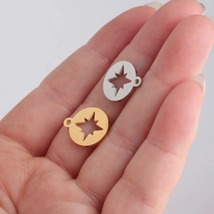 Mirror polished stainless steel star compass pendants in gold and silver finishes