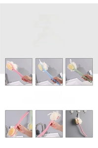 Close-up of three long-handled bath brushes in pink, blue, and green with soft loofah heads