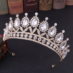 Baroque bridal crown with white crystals and rhinestones on elegant vintage background