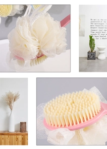 Detail of pink long-handle bath brush showing soft nylon bristles and white bath sponge