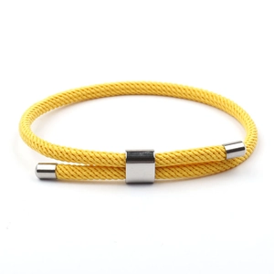 Adjustable yellow braided rope anchor bracelet with silver metal slide fastener