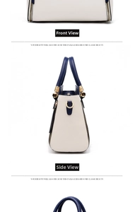 Detail of contrast stitching and gold metal rings on cream and navy tote bag