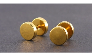 Macro shot of polished gold barbell stud earrings with minimalist round discs on dark surface