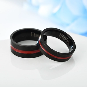 Classic black titanium rings set for couples with red inlay and brushed finish texture