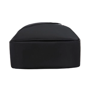 Bottom view of black nylon chest bag showing rectangular structure and stitching details