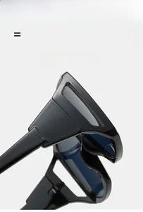 Detail view of bold hollow frames and wide hinges on trendy black urban sunglasses