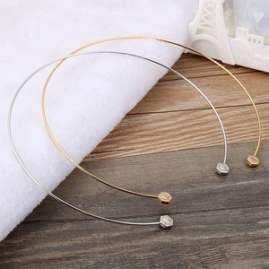 Minimalist open collar necklace in gold and silver finish with hexagon crystal accents