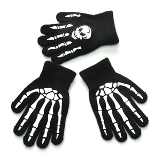 Winter glow-in-the-dark knitted skull gloves for kids aged 5-11 years in black color