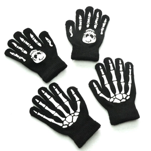 Kids winter knit gloves with luminous skull hand bone patterns on black fabric