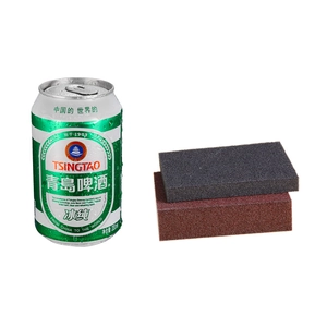 Abrasive carborundum sponge blocks for kitchen cleaning and rust removal on white background