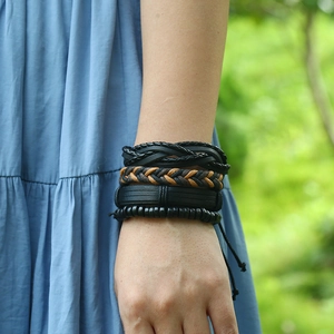 Men's vintage layered bracelet set featuring leather weave and rustic wooden beads