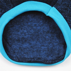 Detail of the blue dog fleece sweater showing knit ribbing and warm fleece inner lining