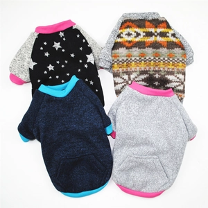 Flat lay of dog fleece hoodies in four different colors with contrast ribbed edges