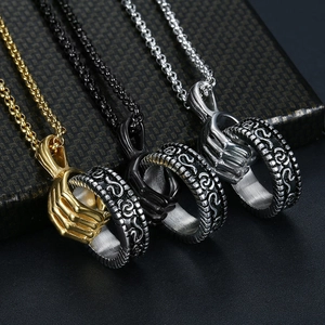 Vintage hip hop skeleton hand pendant necklace in gold black and silver stainless steel finish