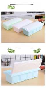 Detailed close-up of 4-compartment seasoning box with lid and spoon for kitchen organization