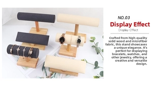 Detail of wooden jewelry stand with black and beige microfiber display bars for watches