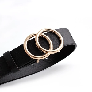 Women's vintage black leather belt with a stylish double gold ring buckle on white background
