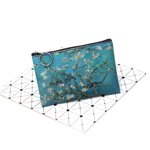 Detail of vintage coin purse with Van Gogh Almond Blossom print and metal zip ring