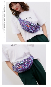 Detail of purple camo waist bag featuring adjustable buckle strap and multi-pocket design