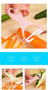 Detalle del pelador en forma de Y para patatas y verduras con orificio para colgar