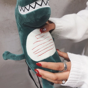 Cute green plush dinosaur crossbody bag for women with soft faux fur and cartoon design