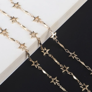 Handmade gold star eyewear chain with hollow stars and polished rhomboid metal links
