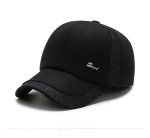 Detail of winter wool baseball cap featuring sport metal logo and textured gray paneling