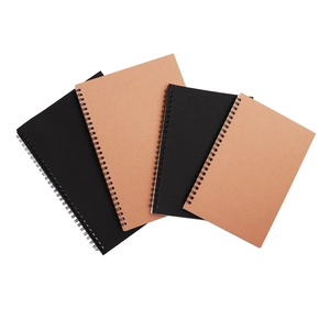 Set of 4 minimalist spiral notebooks with black and kraft paper covers in fan-shaped layout