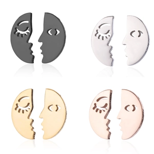 Hollow asymmetric face profile earrings in gold, silver, black, and rose gold finishes