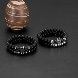 Detail view of black matte beaded crown bracelet with micro-pave cubic zirconia stones