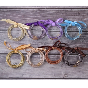 Glitter silicone jelly bracelets set with ribbon bow in eight assorted colors