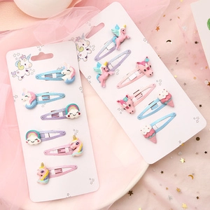 Detailansicht von Kinder Haarspangen Set mit Einhorn und Regenbogen Applikationen