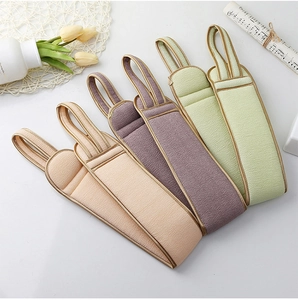 Exfoliating back scrubber set in pastel colors with dual handles and matte texture
