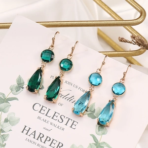 Elegant geometric teardrop crystal earrings in green and sea blue with gold finish
